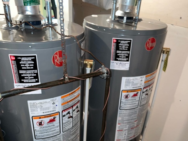 Two gas water heaters were installed in a room located in Alberta, Canada